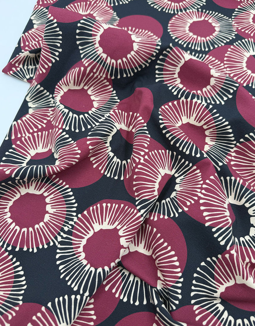 Orbit Bloom Cotton Jersey Fabric
