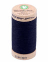 Spool of dark blue thread with a beige label on a white background