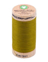 Spool of green thread with a wooden spool and brand label on a white background
